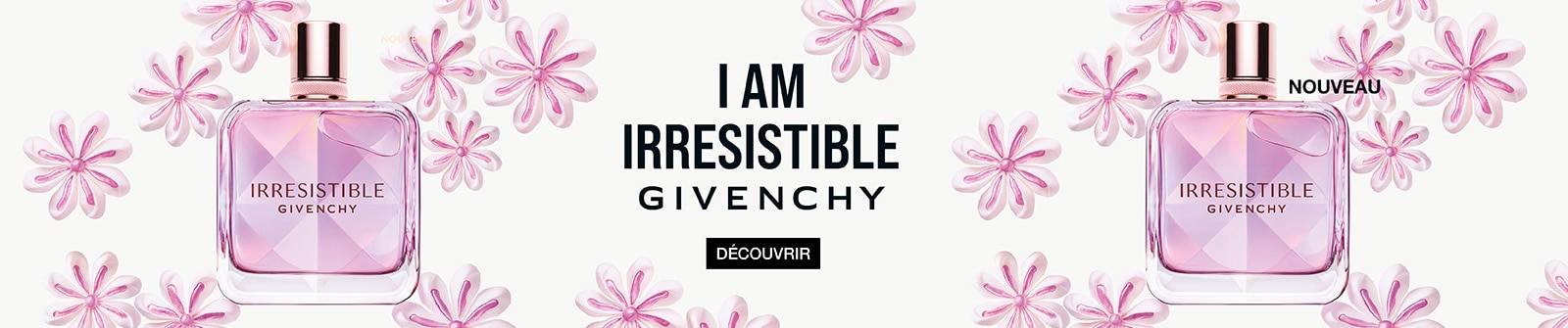 Givenchy Irresistible Eau de Parfum Nectar présenté dans un flacon rose, entouré de fleurs décoratives roses sur fond clair.